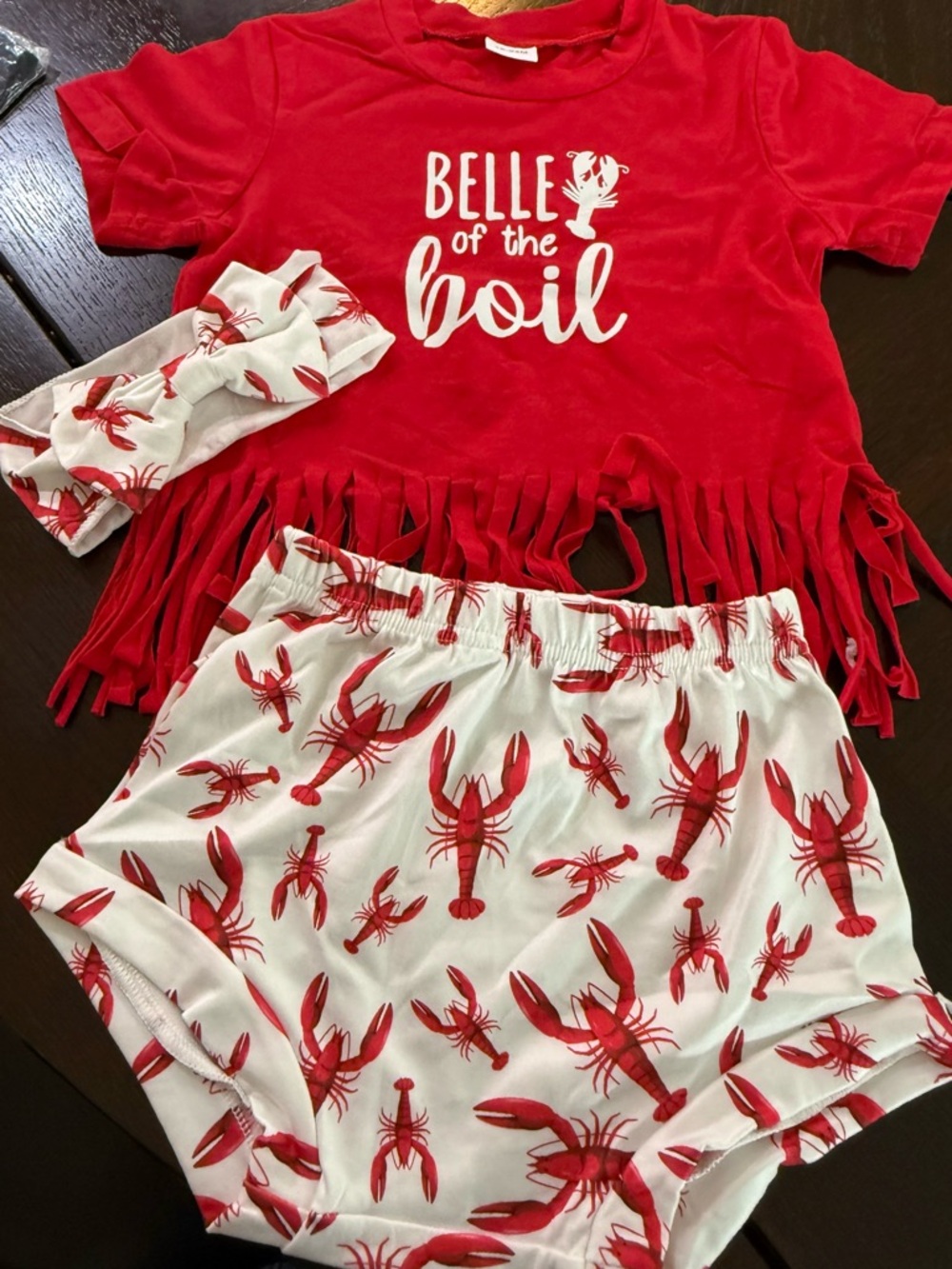 Red "Belle of the Boil" Fringe Tee & Lobster/Crayfish Print Short sets.